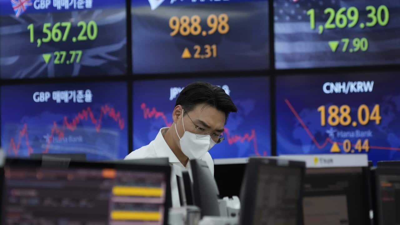 Shares dropped sharply in Asia after a broad retreat on Wall Street triggered by dismal results from major retailer Target