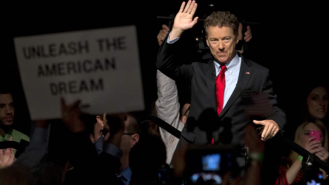 Sen. Rand Paul waves as he arrives to announce the start of his presidential campaign, Tuesday, April 7, 2015, at the Galt House Hotel in Louisville, Ky. (AP Photo/Carolyn Kaster)