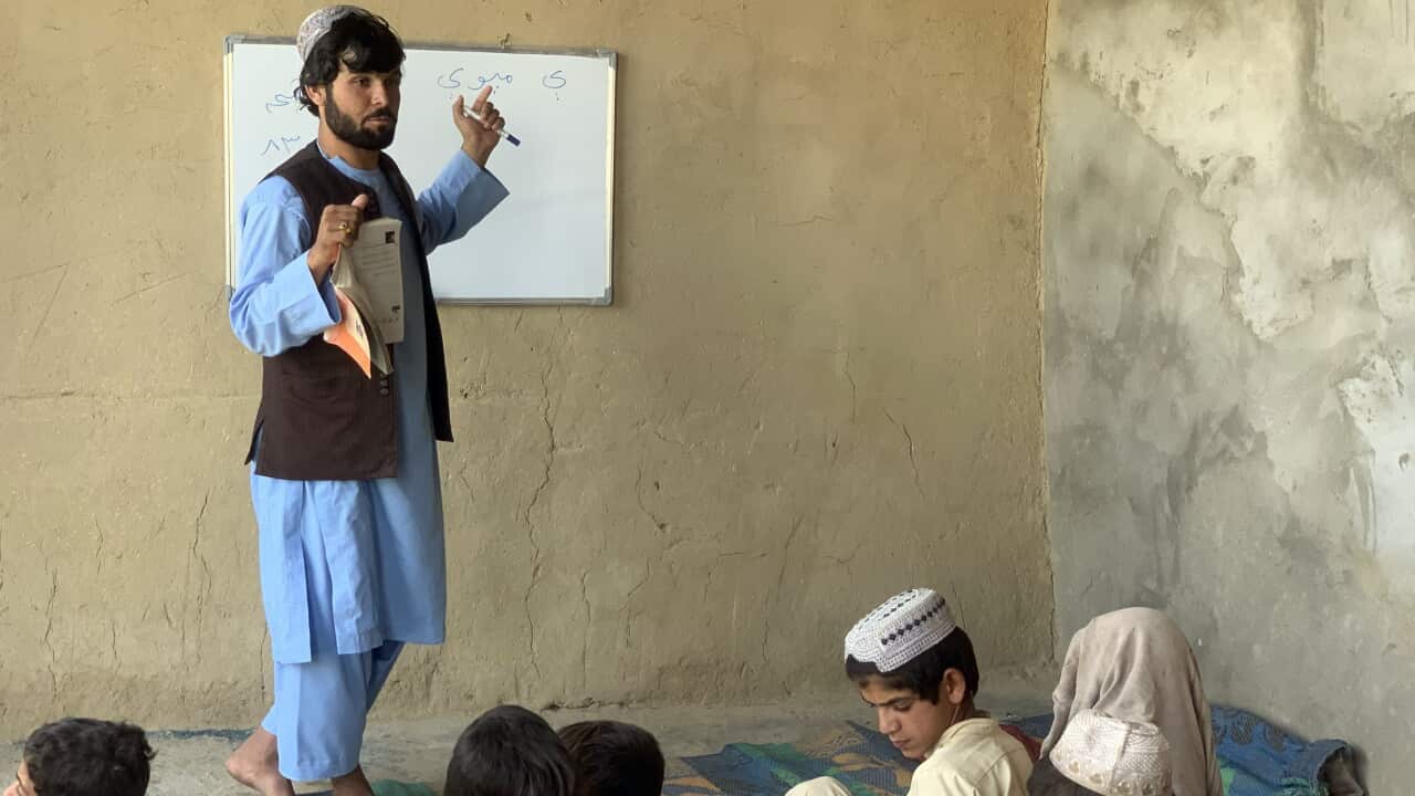 Afghan volunteer turns home to school in Kandahar