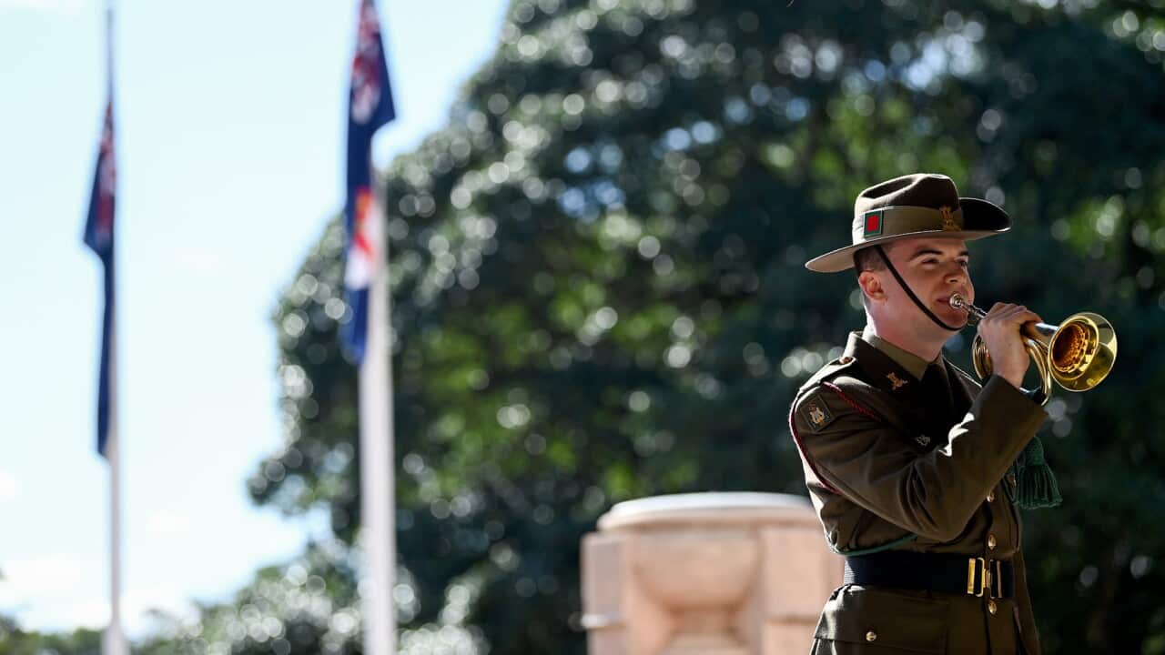 A performer at the 80th anniversary of the Japanese submarine attack on Sydney Harbour