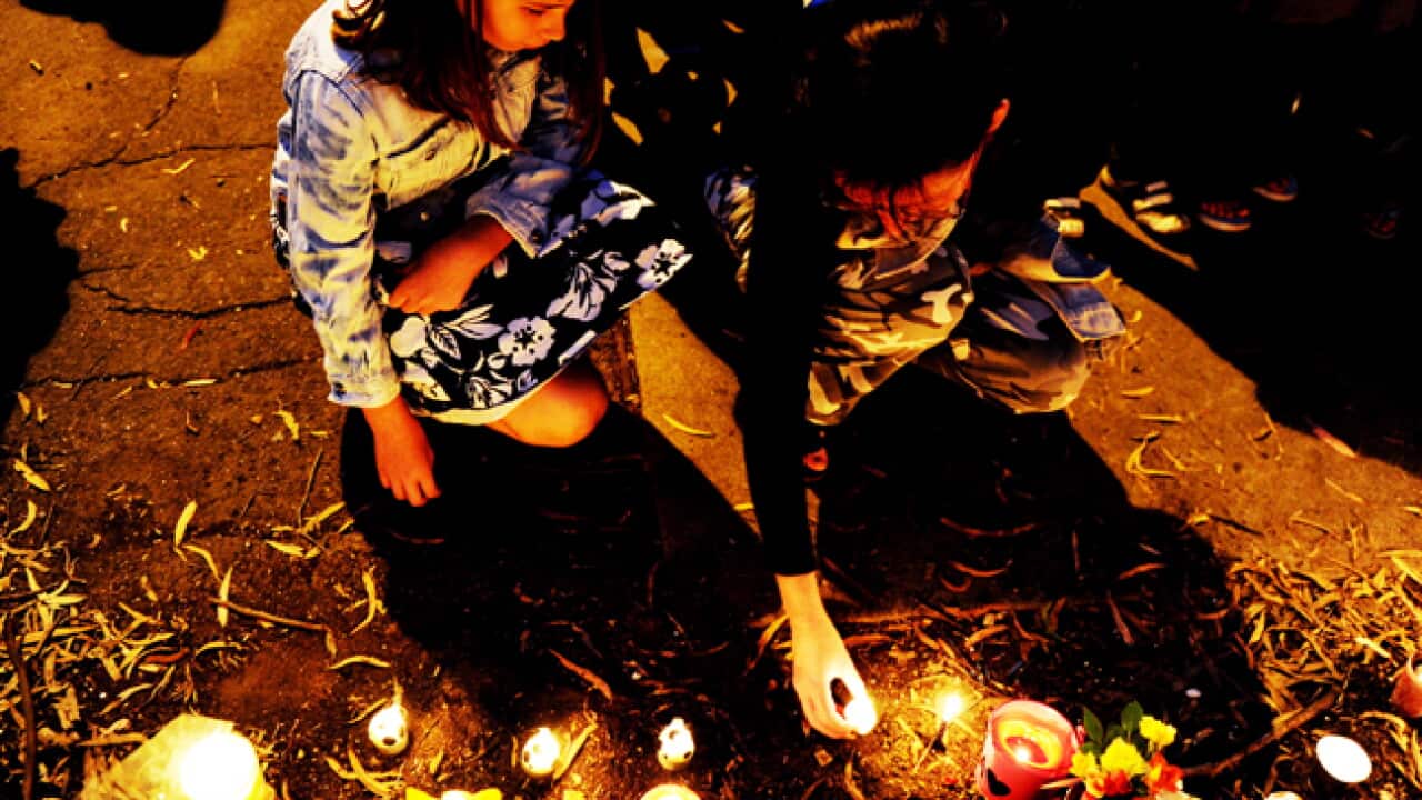 kiesha_abrahams_murder_vigil_230411_B_AAP_2022062450