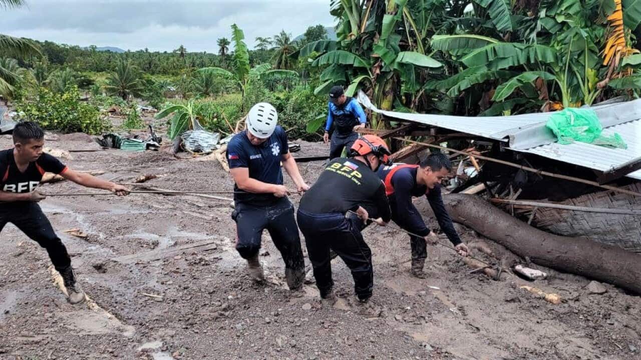 Rescue and recovery operations for victims of Typhoon Paeng in southern Philippines.