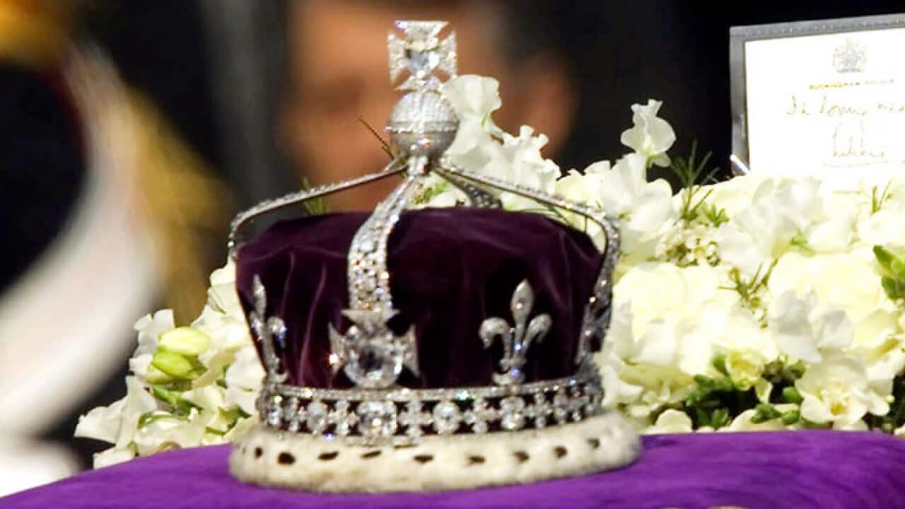 The Koh-i-noor, or "mountain of light," diamond, set in the Maltese Cross at the front of the crown made for Britain's late Queen Mother Elizabeth (AP Photo/Alastair Grant/File)
