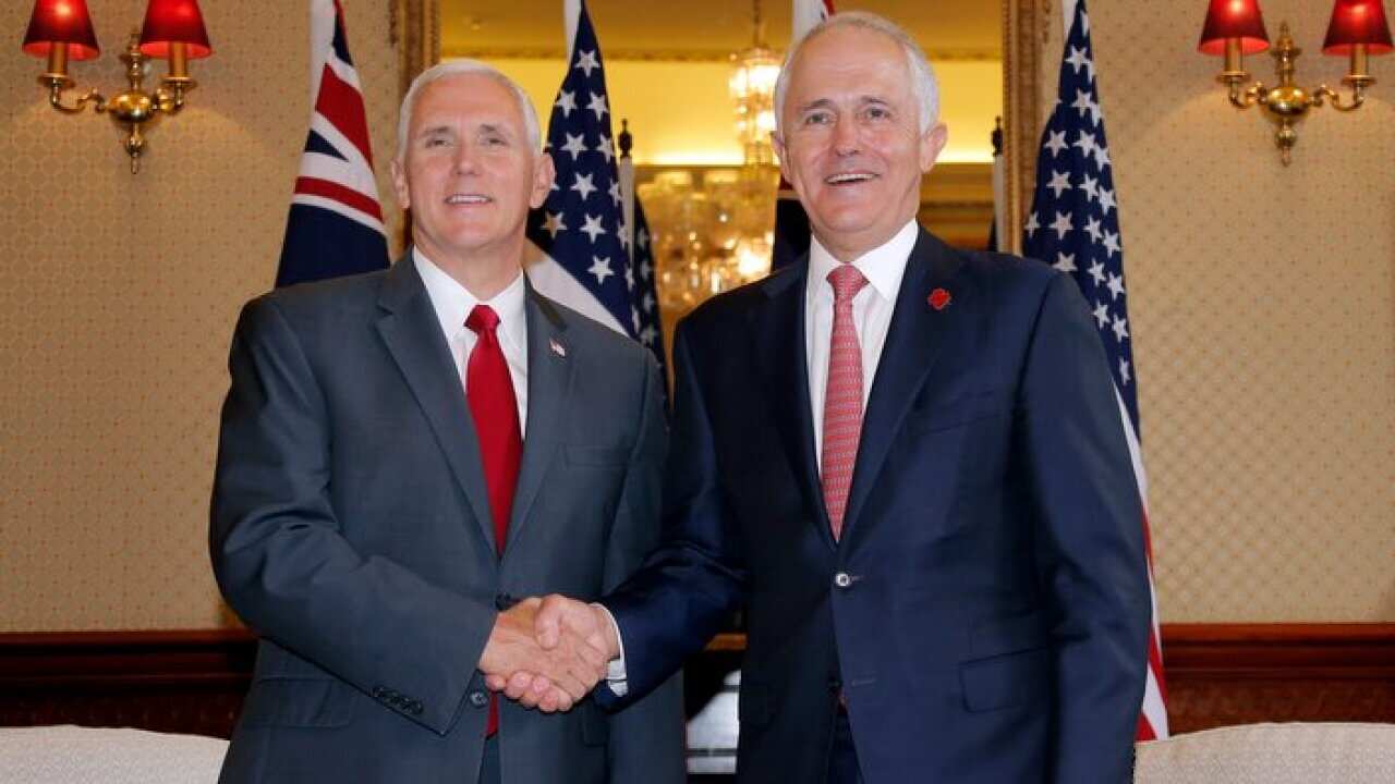 U.S. Vice President Mike Pence, left, shakes hands with Australia's Prime Minister Malcolm Turnbull at Admiralty House in Sydney, Saturday, April 22, 2017. (Jason Reed/Pool Photo via AP)