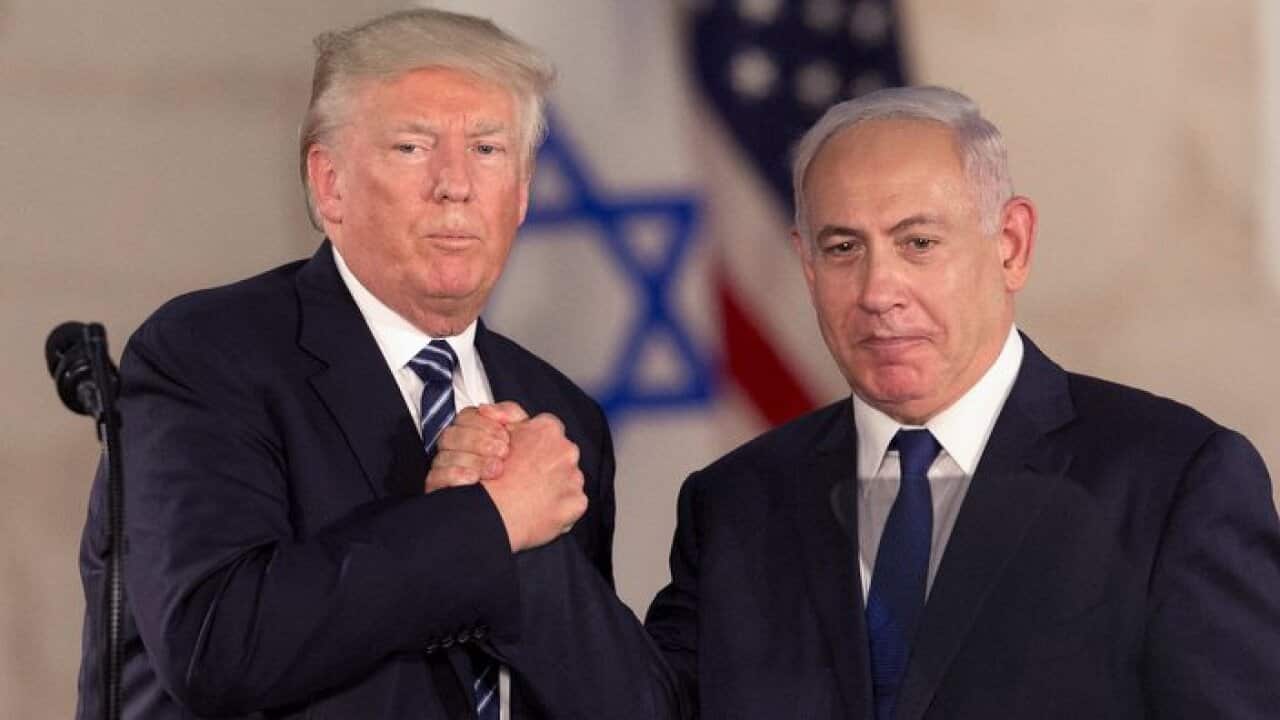 U.S. President Donald Trump and Israeli Prime Minister Benjamin Netanyahu shake hands at the Israel Museum, in Jerusalem, Tuesday, May 23, 2017. (AP Photo/Sebastian Scheiner)