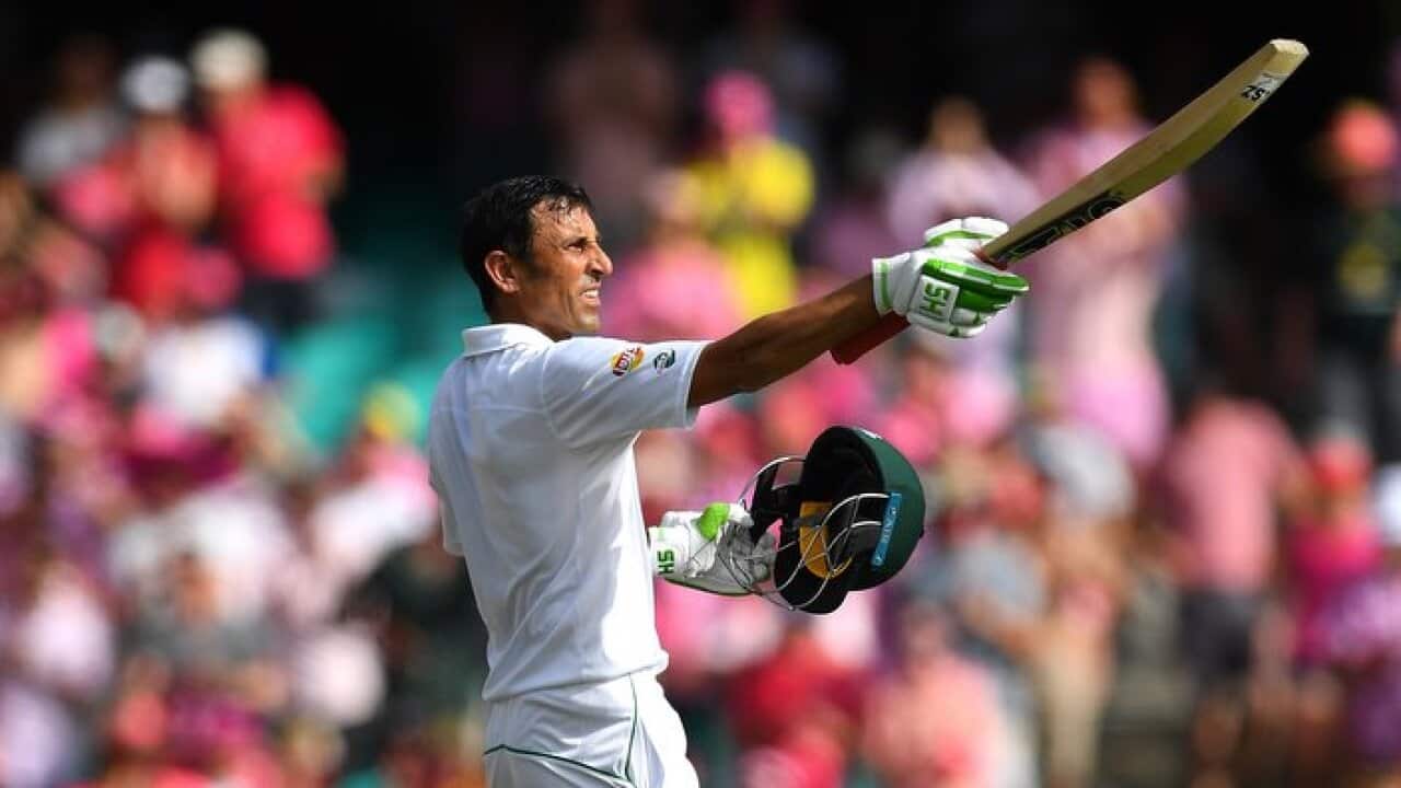 Younis Khan of Pakistan gestures to the crowd after scoring a century on Day 3 of the Third Test match between Australia and Pakistan