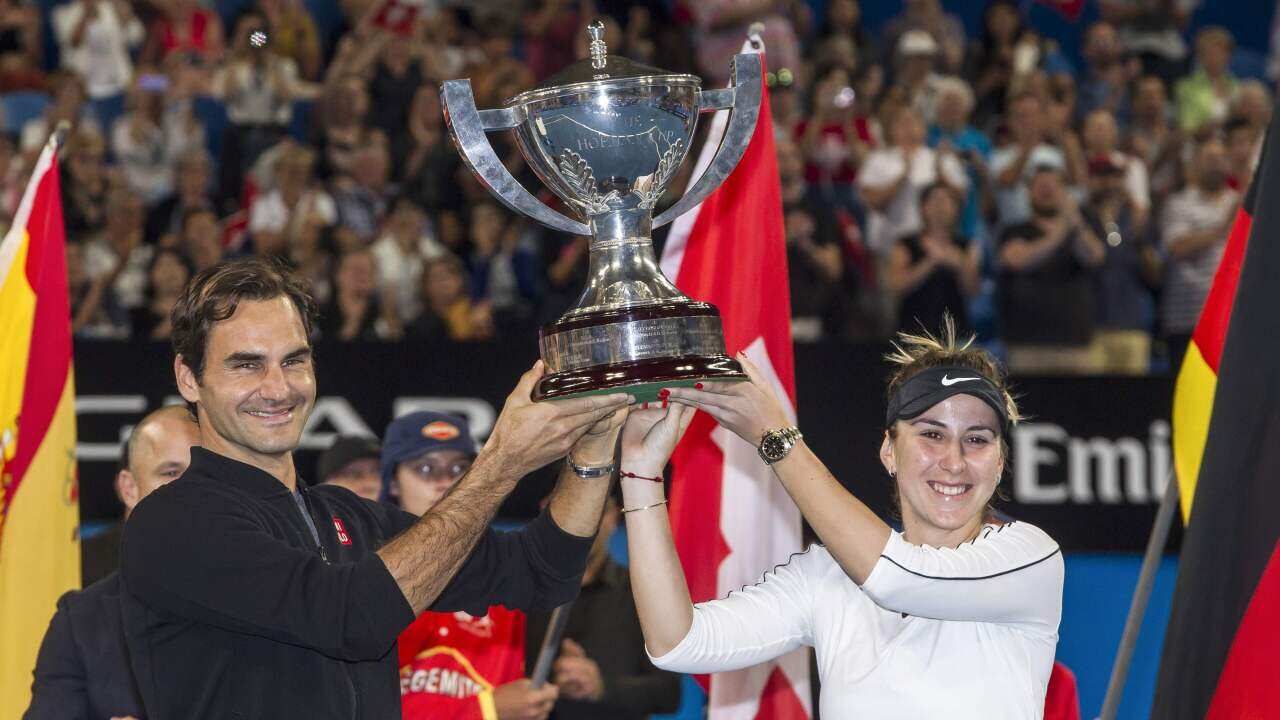 Roger Federer and his mixed doubles partner Belinda Bencic