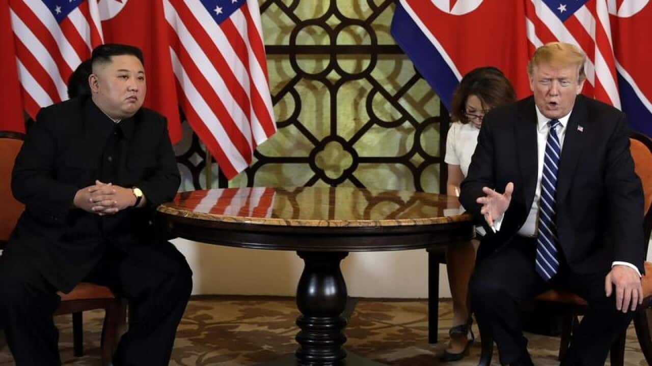 US President Donald Trump (R) and North Korea's Kim Jong-un