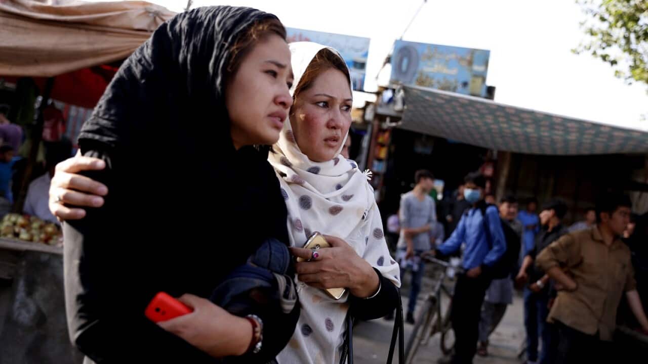 Women at the scene of a suicide bomb attack in Kabul, Afghanistan.