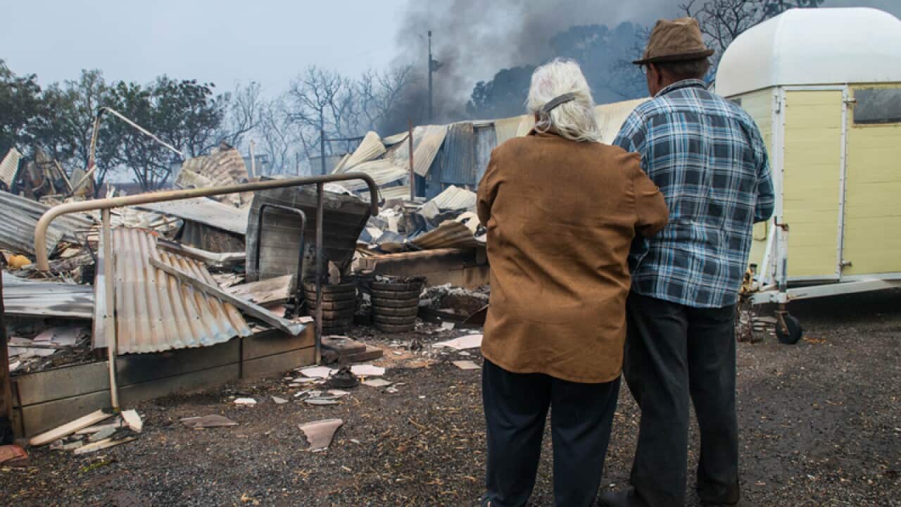 Property owners inspect their destroyed house near Roseworthy