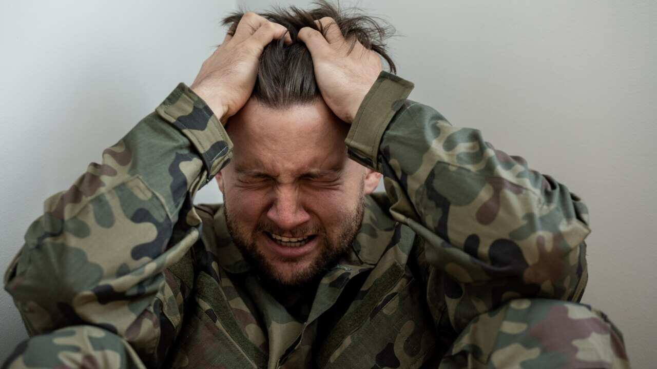 Model depicting soldier with Post Traumatic Stress Disorder.