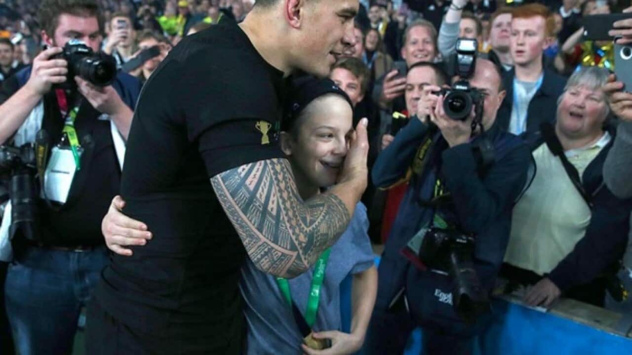 Sonny Bill Williams with the happy boy