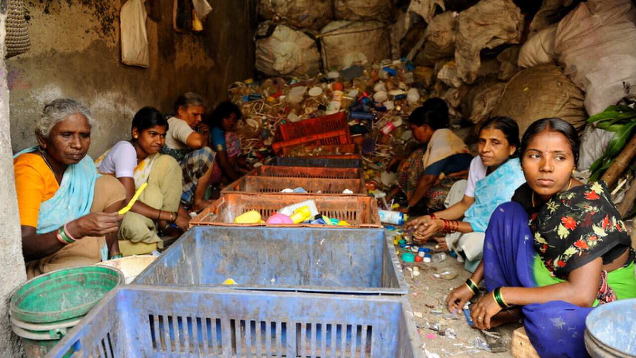 Waste sorting in Dharavi. The recycling industry of the slum is the largest of Mumbai
