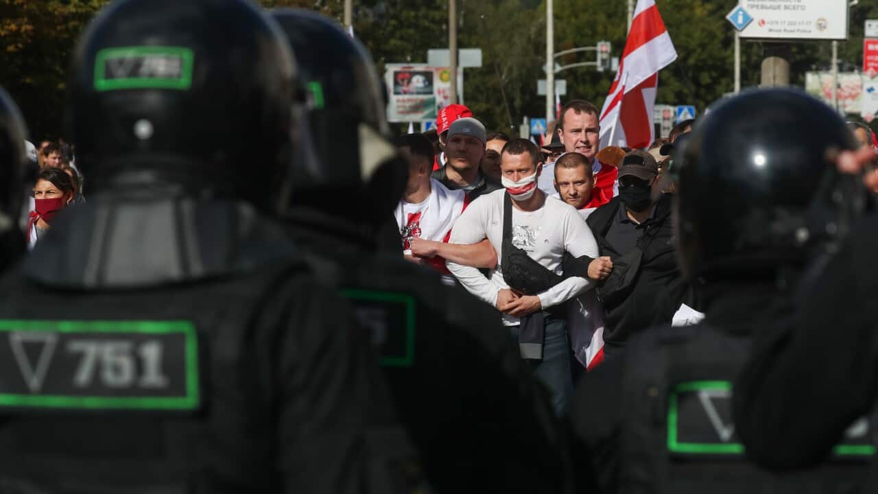 Riot police block a street during an opposition rally in Minsk on 13 August, 2020.