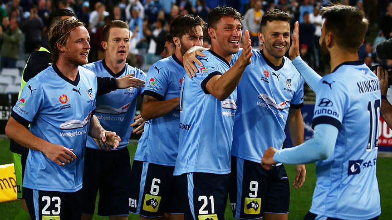 Sydney FC players celebrate