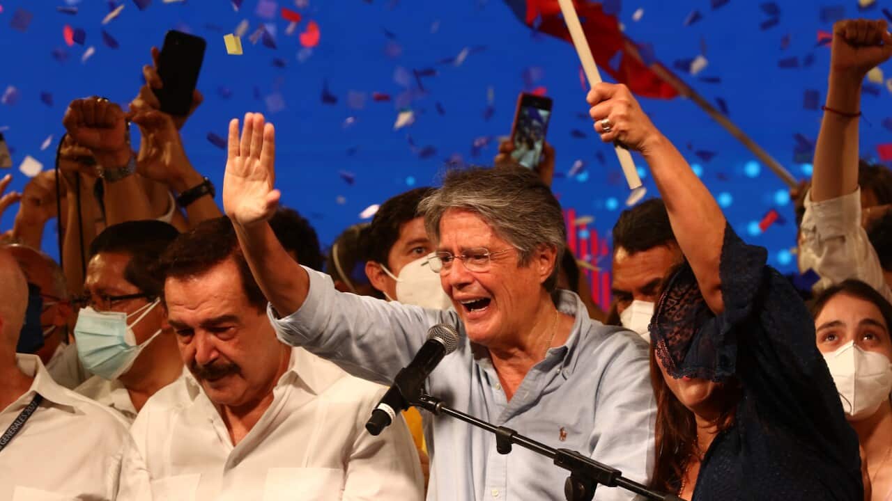 Newly elected President of Ecuador Guillermo Lasso celebrates after winning the presidential runoff on 11 April, 2021.