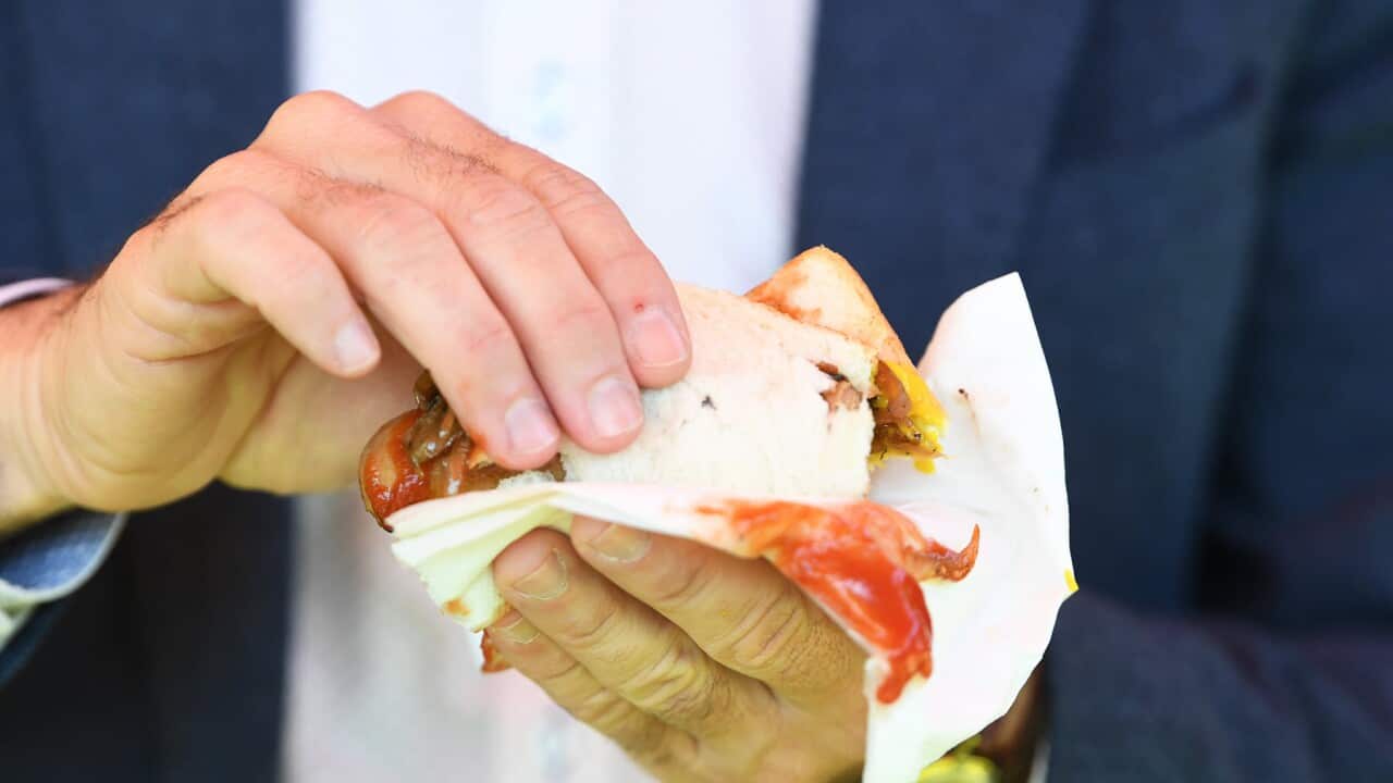 A democracy sausage ready to be eaten on election day