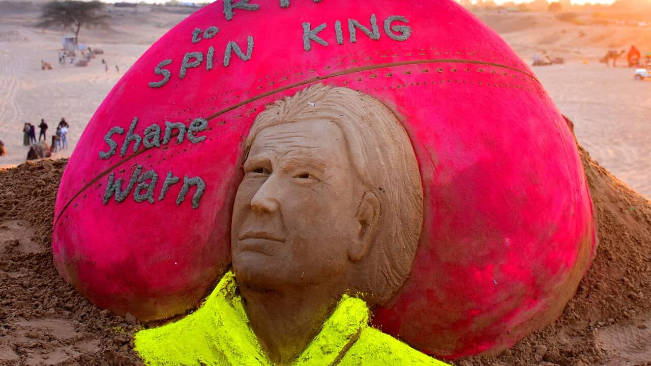 Artist creates a sand sculpture to pay tribute to Australian legendary spinner Shane Warne, who passed away on Friday, in Desert of Pushkar, Rajasthan, India on 5 March 2022.
