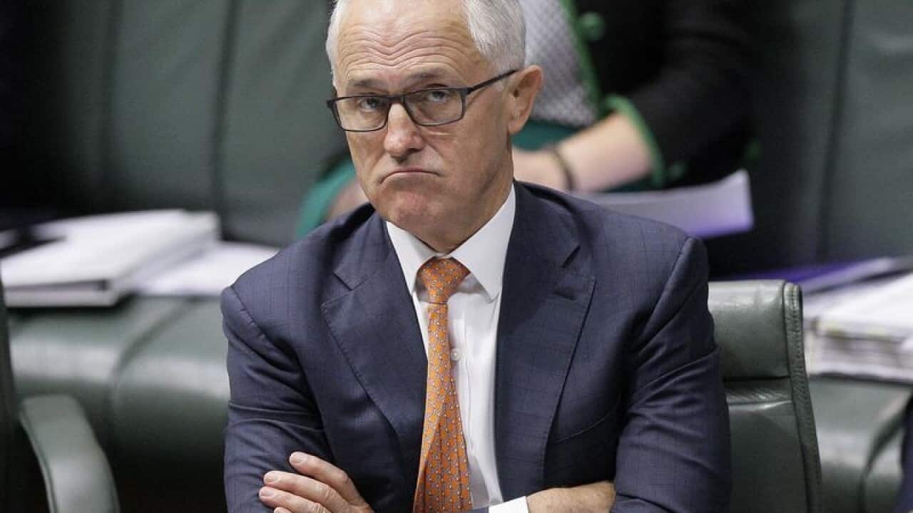 Australian Prime Minister Malcolm Turnbull looks dejected.
