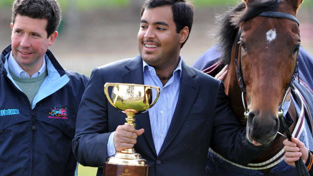 Dunaden_owners_celebrate_Melb_cup_B_111102_AAP_2138172100