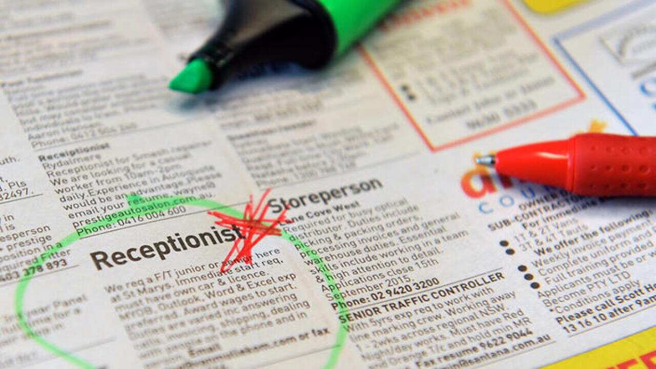 Employment advertising in a newspaper in Sydney. The number of jobs being advertised hit a 17-month high in August, suggesting the labour market is improving despite after a jump in the unemployment rate. (AAP Image/Joel Carrett) NO ARCHIVING