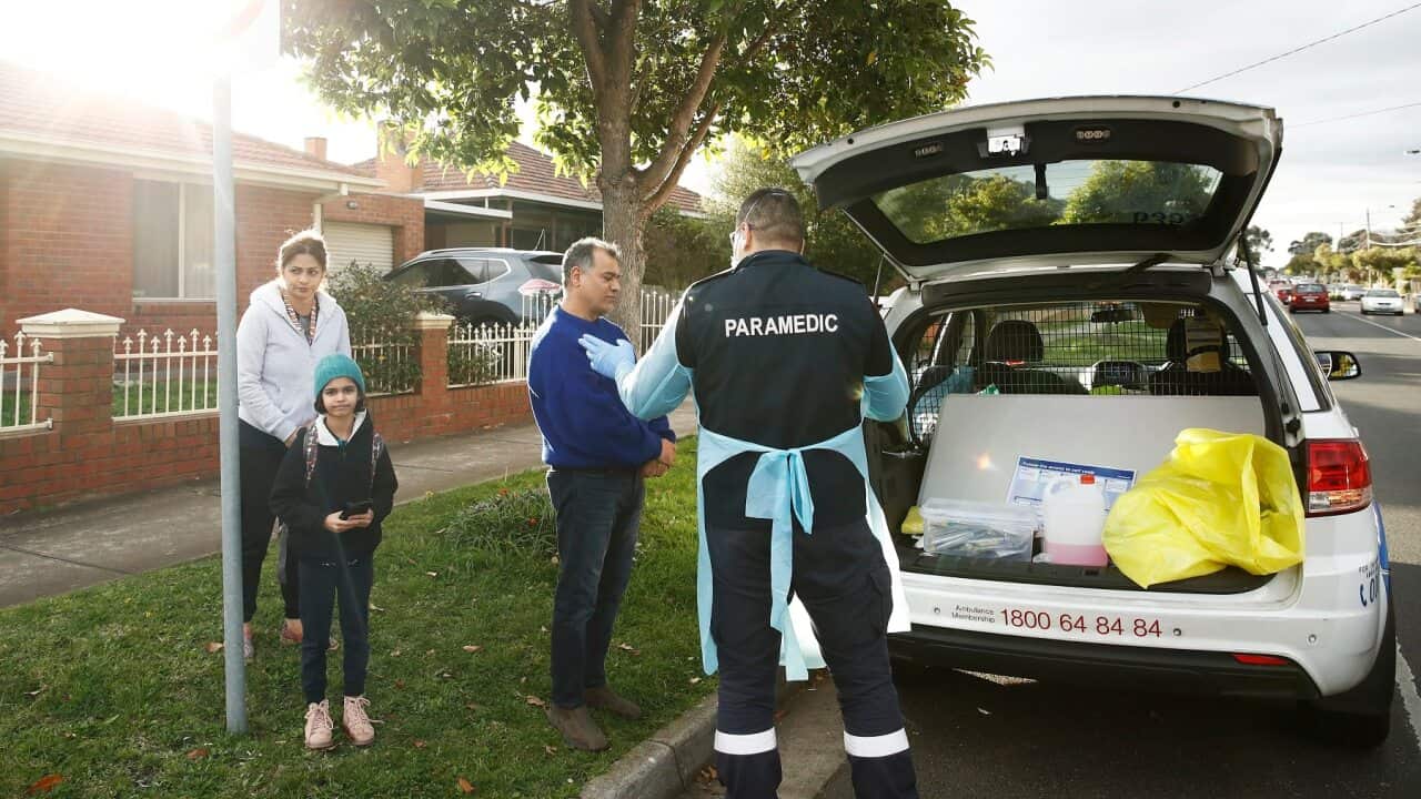 Paramedics perform COVID19 tests in Broadmeadows, Victoria.