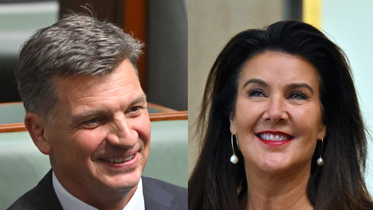 A composite image of a white man and white woman smiling