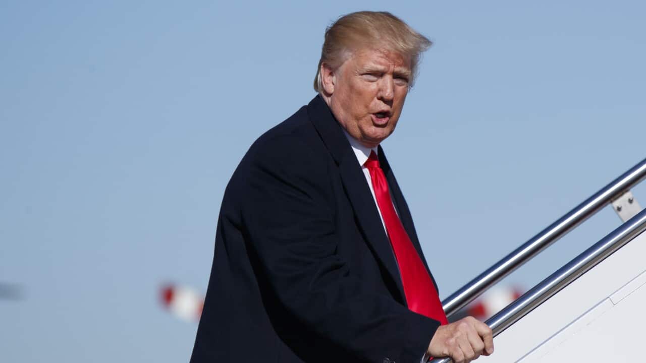 President Donald Trump boards Air Force One, Thursday, Jan. 18, 2018