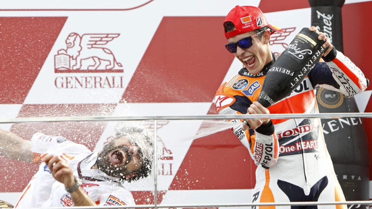 Marc Marquez celebrates his win.