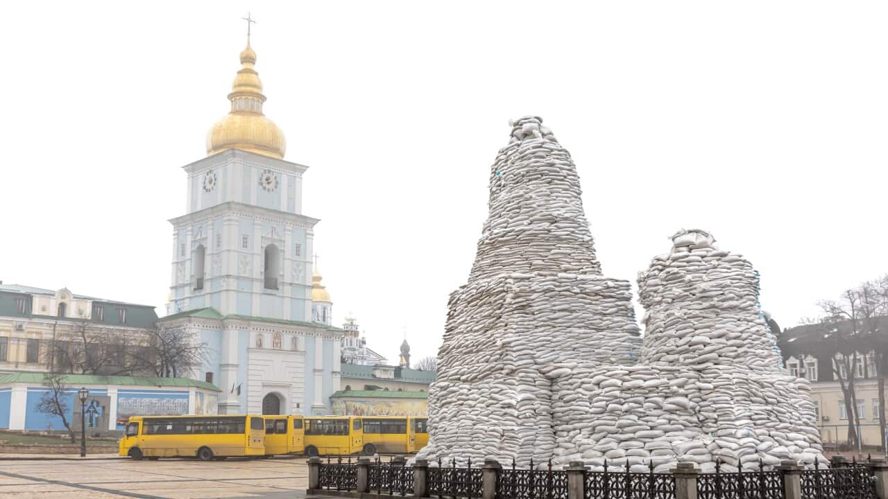 Volunteers completed to cover a monument of the Princess Olga, Apostle Andrew, Cyril and Methodius with sand bags to protect it of a possible bombardment.