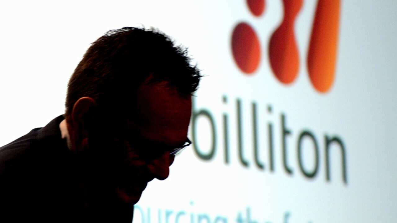 BHP Billiton CEO Andrew Mackenzie at the company's half year results