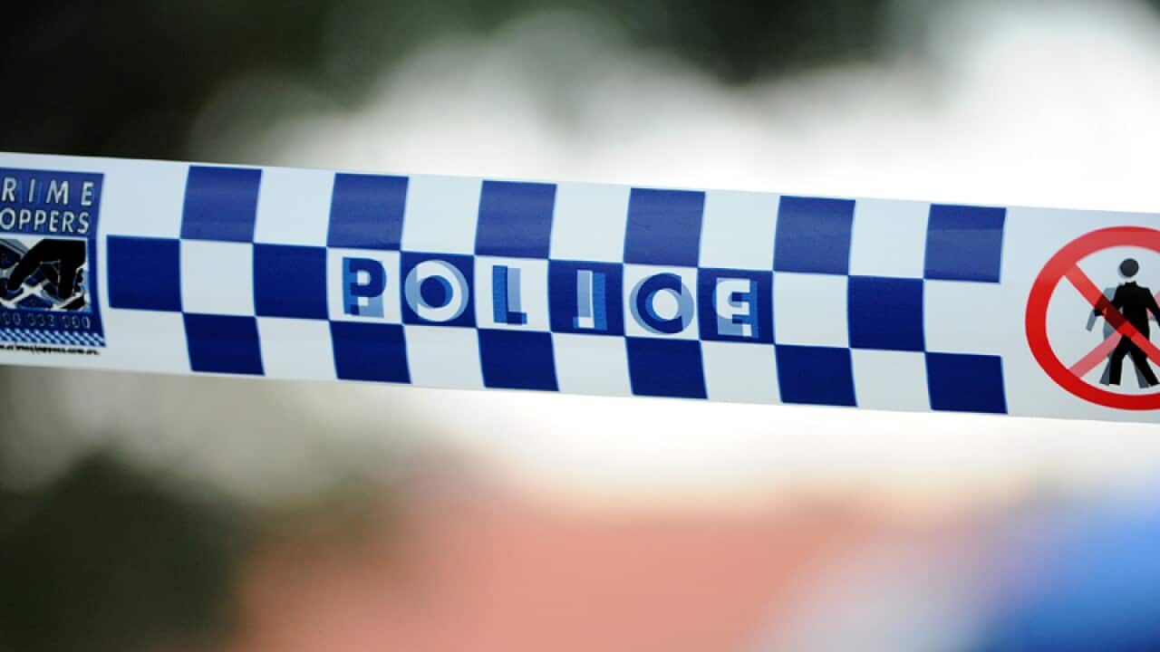 Police tape outside a home