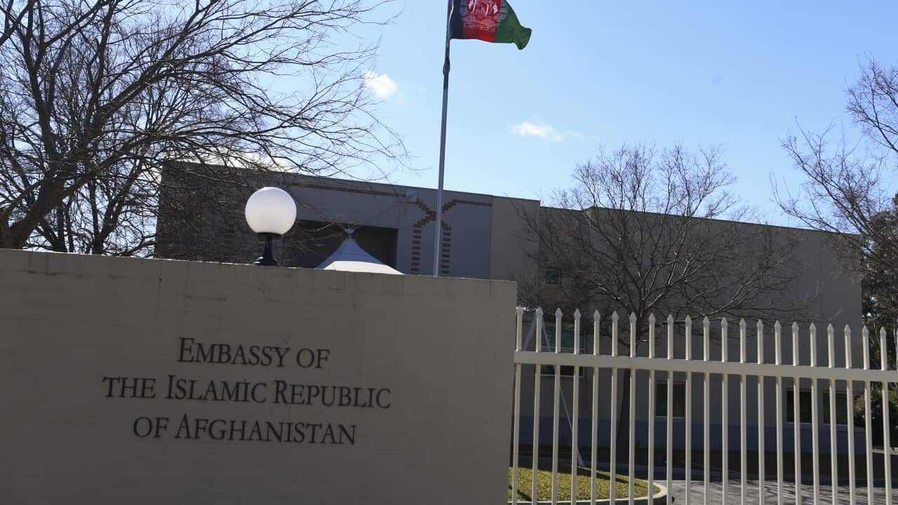 The Afghan embassy in Canberra, a pale building with a closed gate.