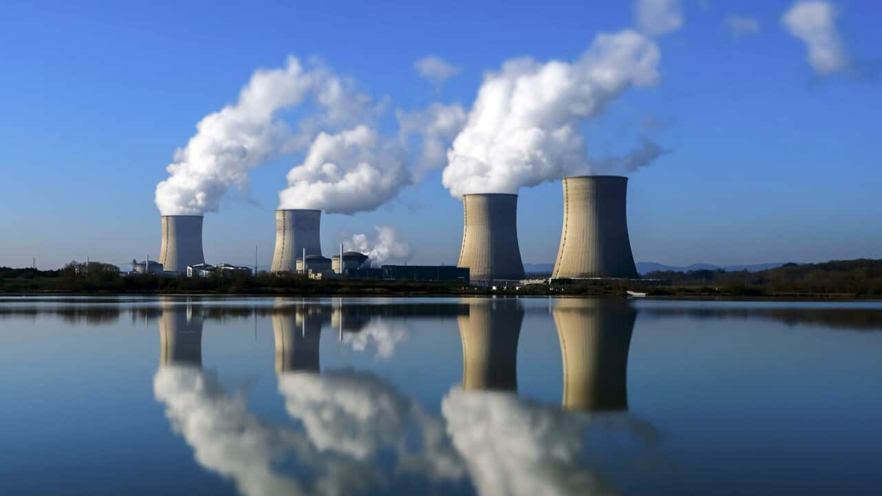 Nuclear energy plant and plumes.