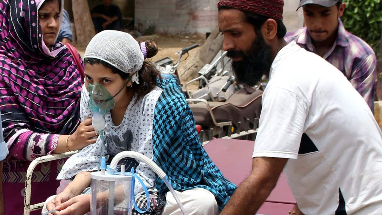Hundreds of Karachi residents are treated for heat-related conditions including fever and dehydration,(AAP Image/NEWZULU/SYED RIZWAN ALI)