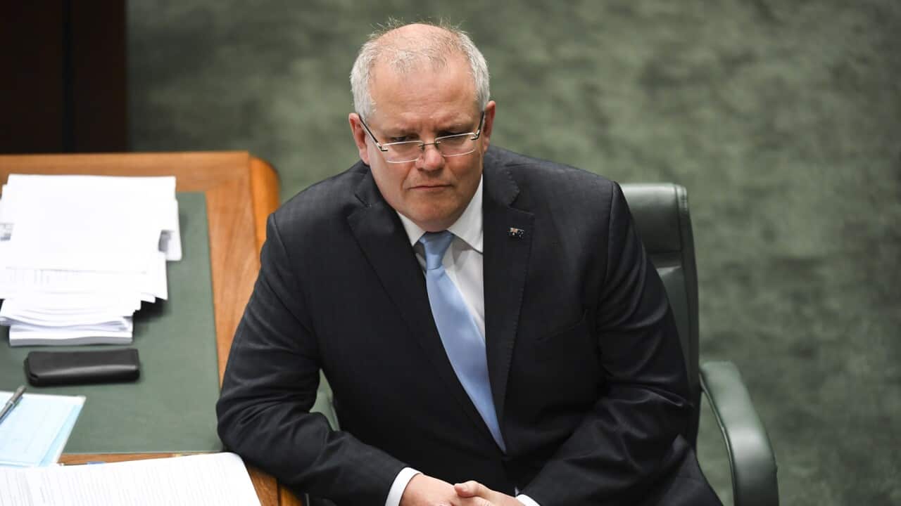 Australian Prime Minister Scott Morrison reacts during House of Representatives Question Time at Parliament House in Canberra, Wednesday, April 8, 2020. (AAP Image/Lukas Coch) NO ARCHIVING
