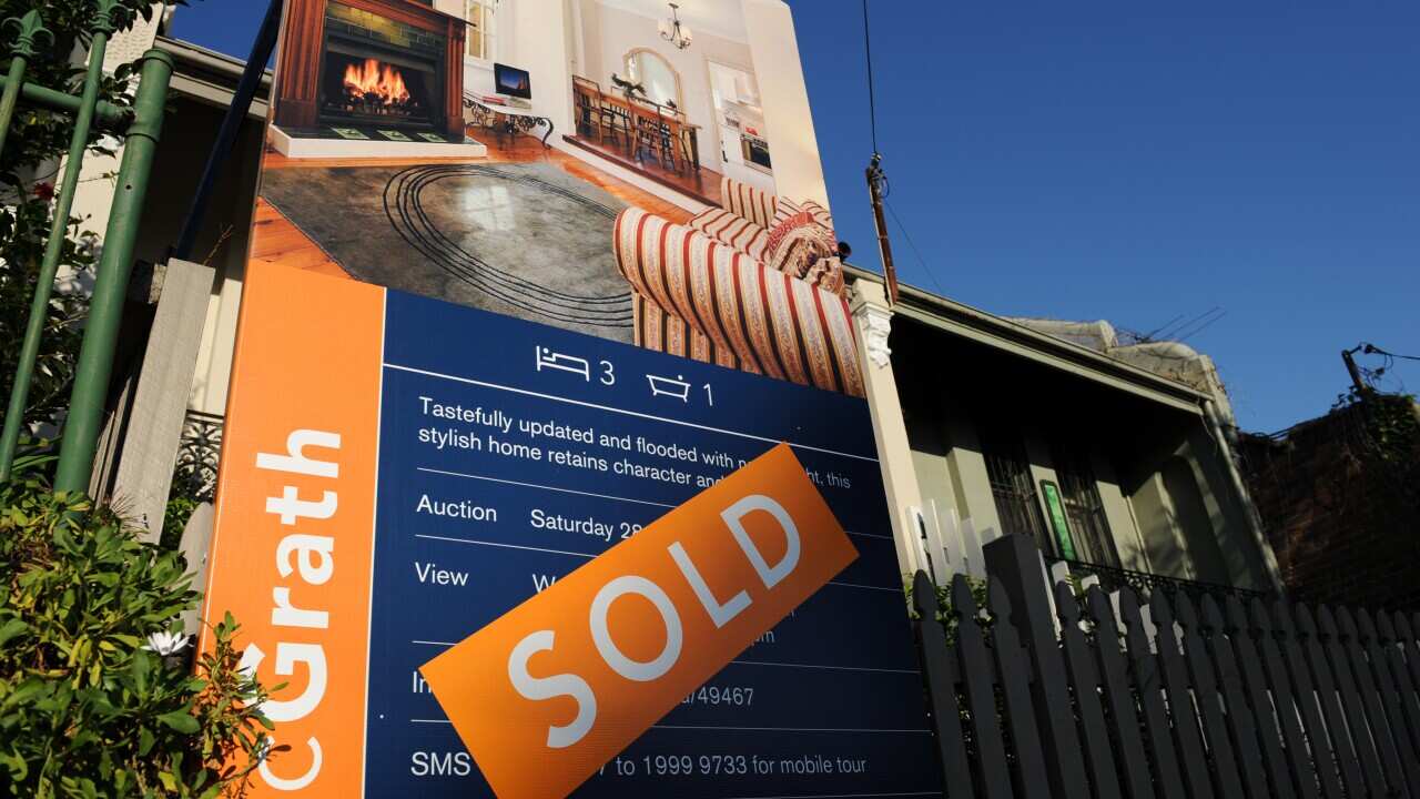 A house with a 'For Sale/Sold' sign in Sydney on Sunday, May 3, 2009. (AAP Image/Paul Miller) NO ARCHIVING