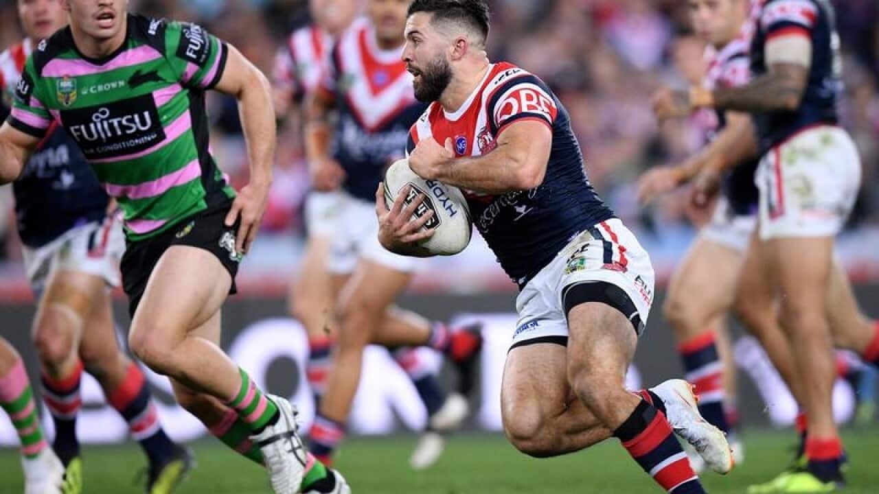 James Tedesco of the Roosters makes a break during Round 22.