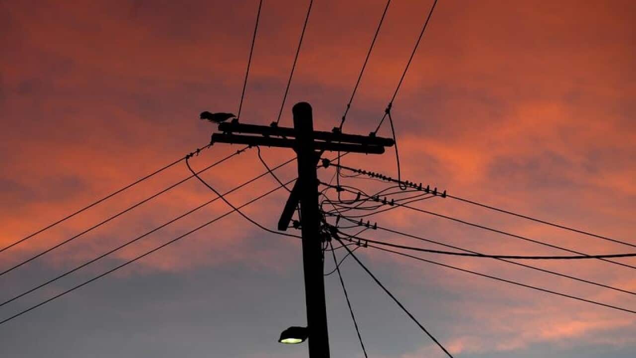 An electricity pole.