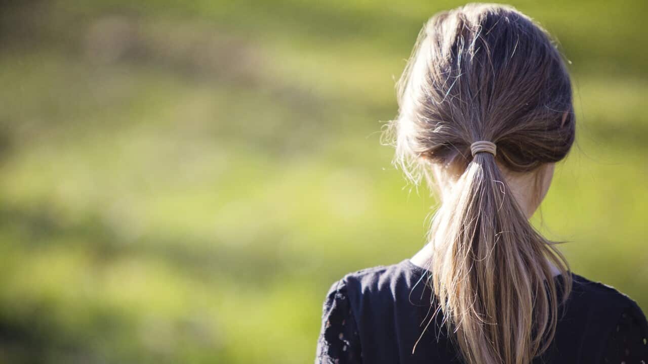 Rear view of girl outdoors
