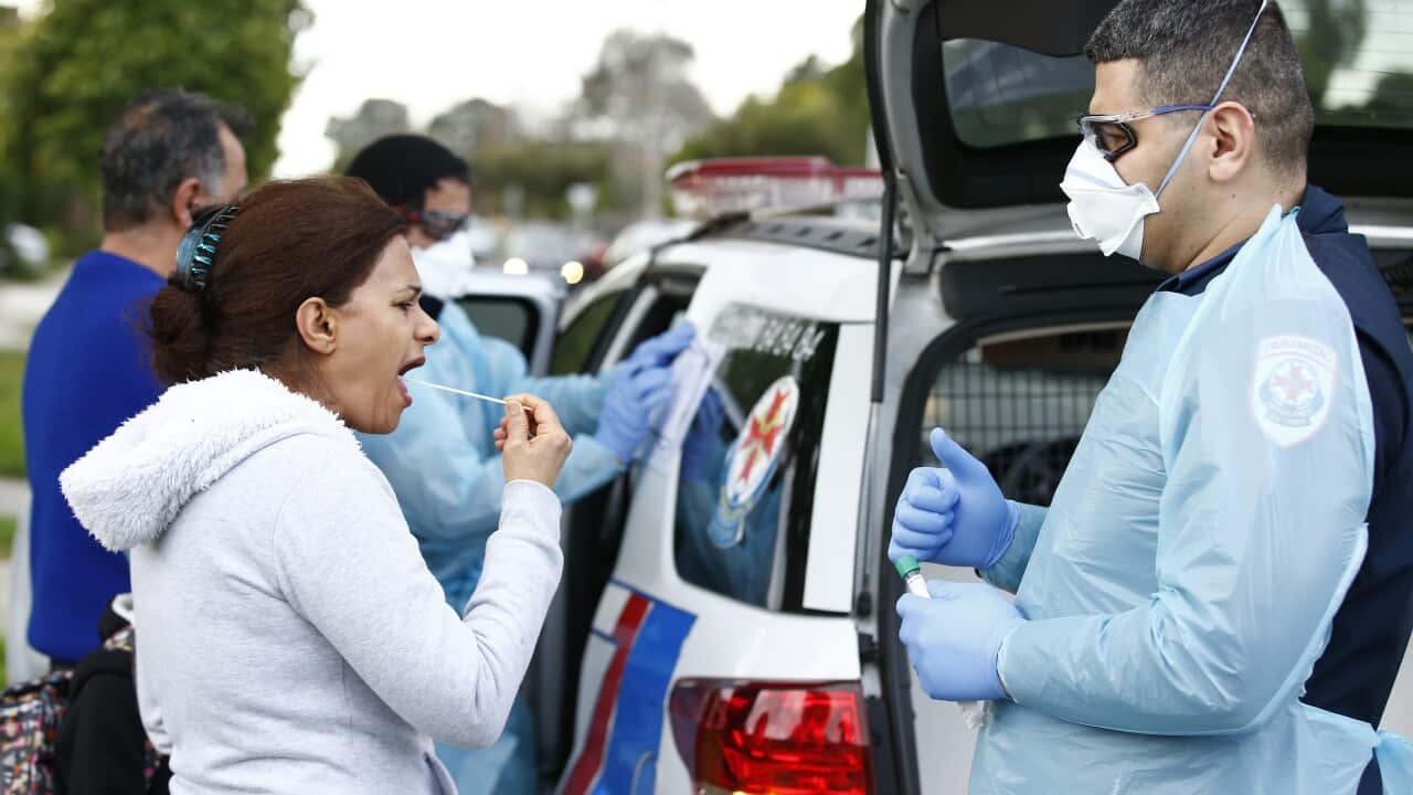 Paramedics perform COVID-19 tests in Broadmeadows.