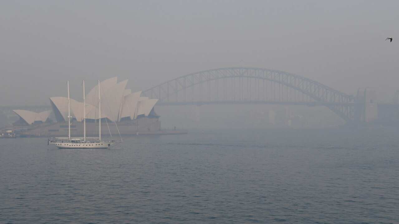 Thick smoke obscures the Sydney Opera House and Sydney Harbour bridge