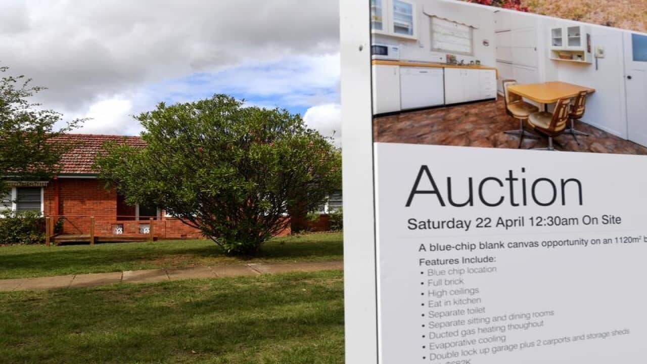 A real estate advertising board