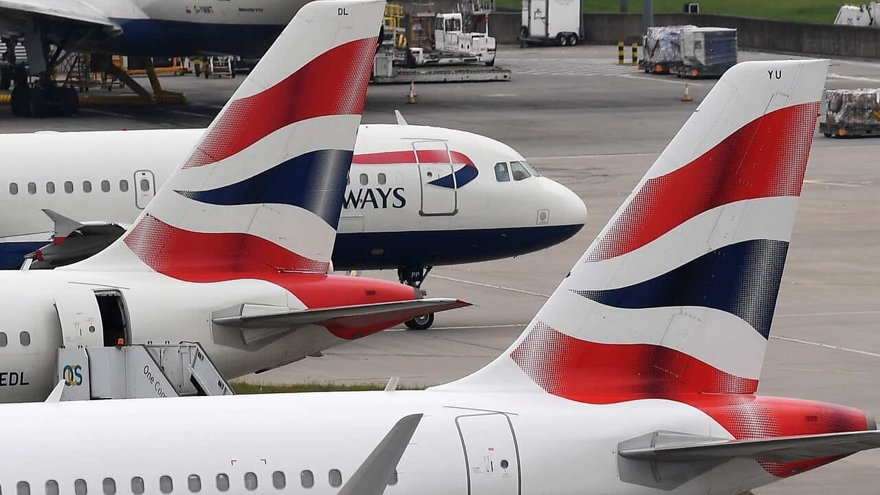 British Airways aircraft stand on their parking positions at Heathrow Airport in London.