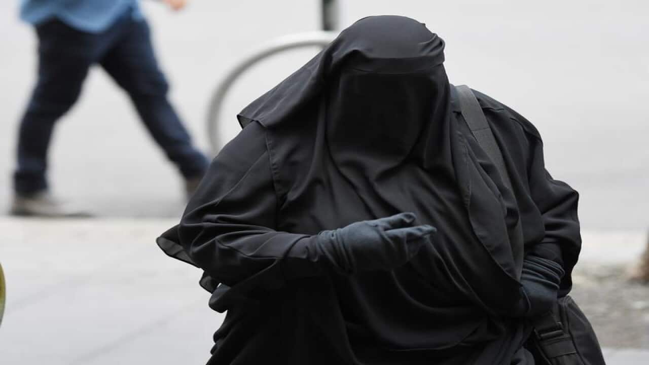 Moutia Elzahed arrives to the Downing Centre court