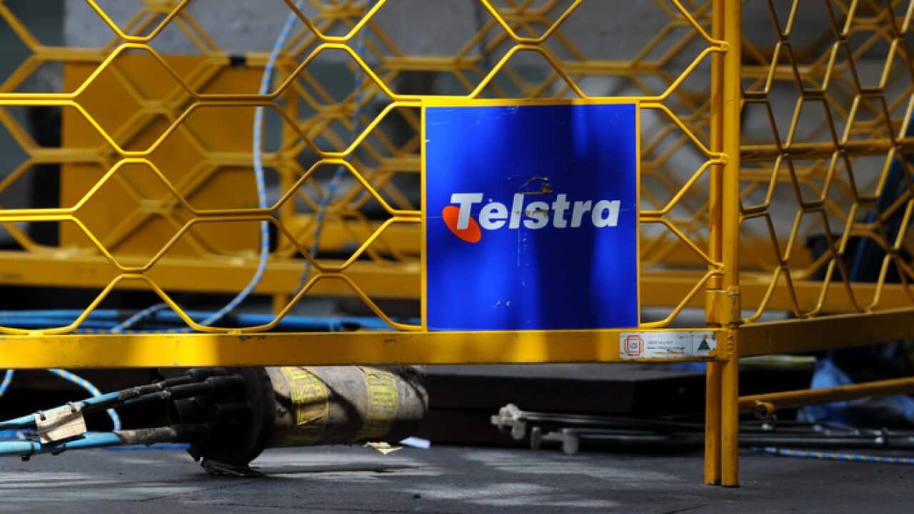 Telstra signage seen at a work site in Sydney.