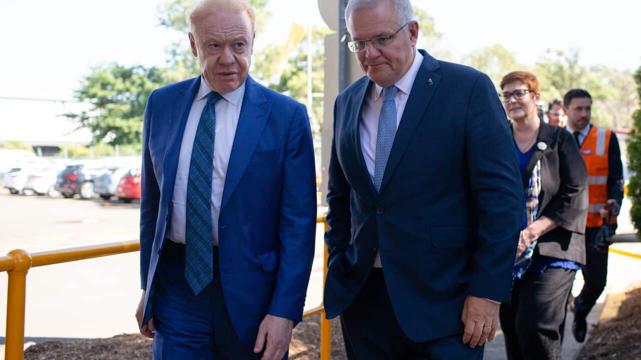 Prime Minister Scott Morrison (right) speaks with Executive Chairman of Visy Industries Anthony Pratt before touring its manufacturing facility in Penrith, Greater Sydney, Friday, 26 February, 2021. (AAP Image/Paul Braven) NO ARCHIVING