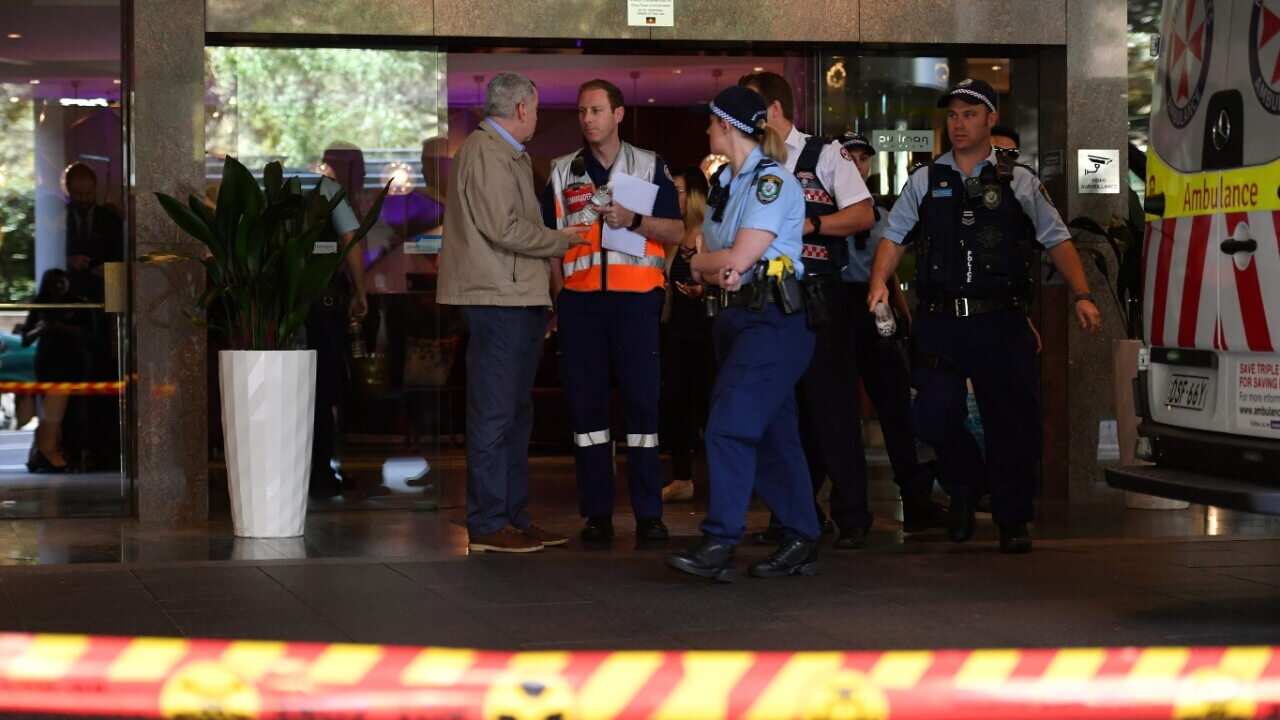 Emergency service workers at the scene of a chemical leak at the Pullman Hotel in Sydney, Wednesday, September 19, 2018.