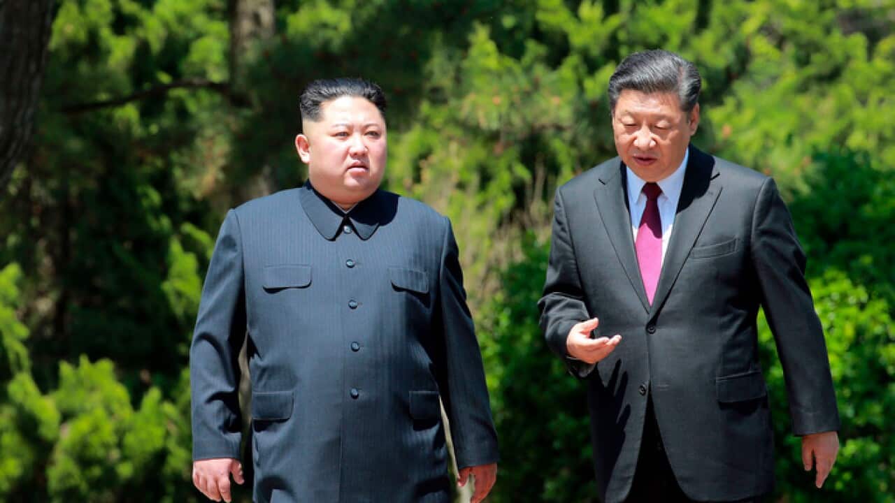 North Korean leader Kim Jong-un, left, and Chinese President Xi Jinping in China in May this year