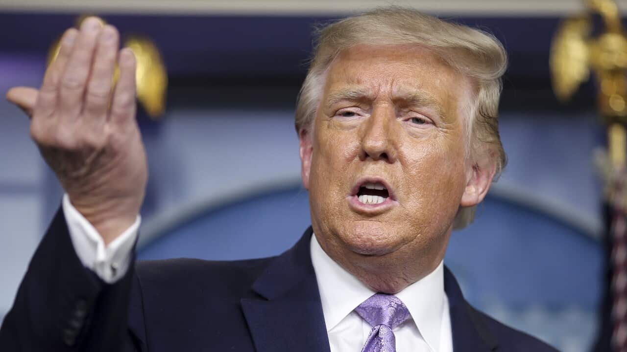President Donald Trump speaks during a press briefing at the White House on 13 August.